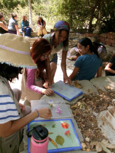 Woman doing arts and crafts with children